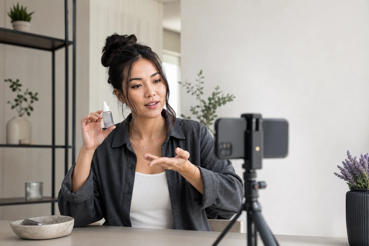 A creator filming an unbranded skincare recommendation in a bright home studio